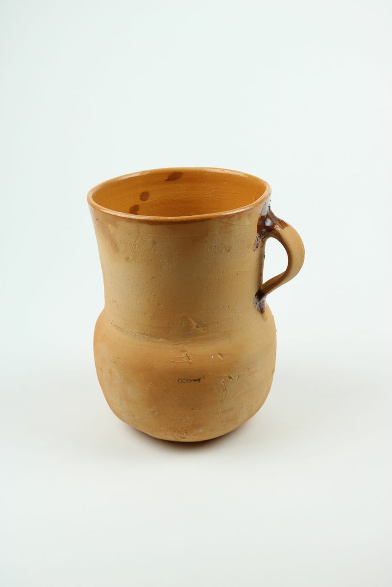 Object -- Bean pot, Mexico, 1950s-1990s Curator -- Margariya Solorzano, executive director of the Hispanic Women's Organization of Arkansas Why she selected it -- "The bean pot (la olla de los frijoles) is a staple item in Mexican kitchens. This simple, undecorated item has a special place in my memory as it reminds me of my hometown and the friendliness of its people. In every house you visit, they ask visitors to share a meal, even if all they have to offer is boiled beans (frijoles de la olla). The aroma of boiling beans transports the imagination to another time and to the variety of dishes that start with beans boiled in the olla de barro."