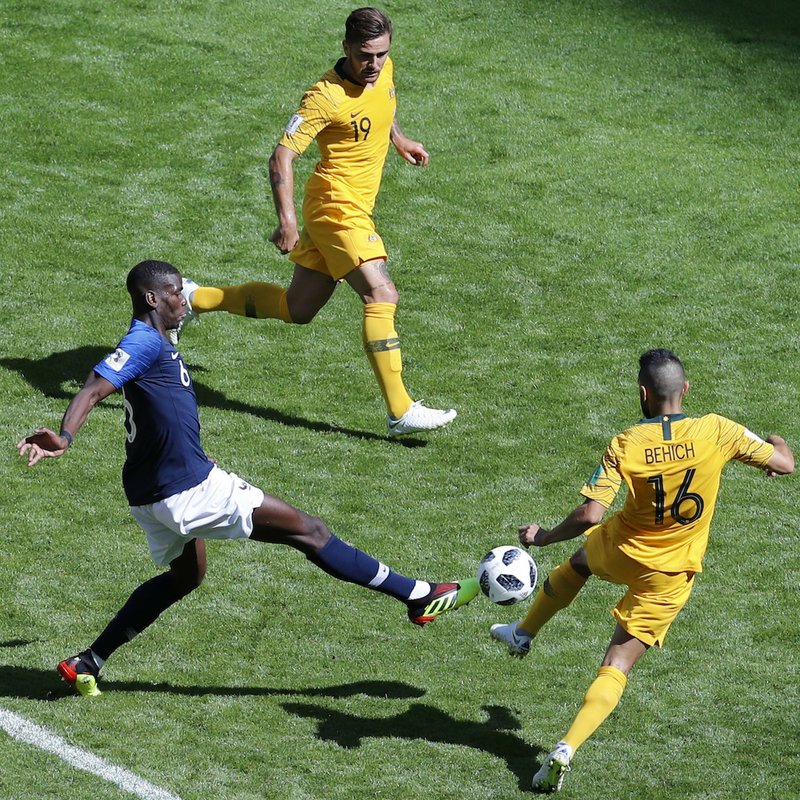 France's Paul Pogba, center, scores his side's second goal during the group C match between France and Australia at the 2018 soccer World Cup in the Kazan Arena in Kazan, Russia, Saturday, June 16, 2018. (AP Photo/Hassan Ammar)