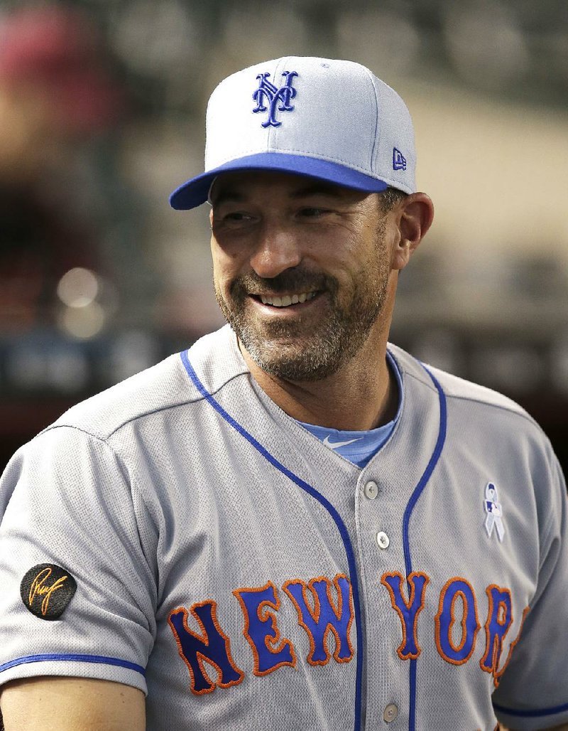New York Mets manager Mickey Callaway (36) in the first inning during a baseball game against the Arizona Diamondbacks, Sunday, June 17, 2018, in Phoenix. (AP Photo/Rick Scuteri)