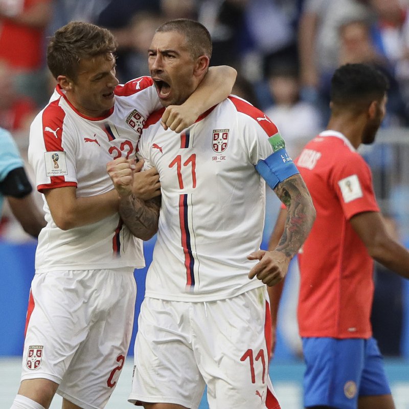 Serbia's Aleksandar Kolarov celebrates scoring the opening goal during the group E match between Costa Rica and Serbia at the 2018 soccer World Cup in the Samara Arena in Samara, Russia, Sunday, June 17, 2018. (AP Photo/Mark Baker)