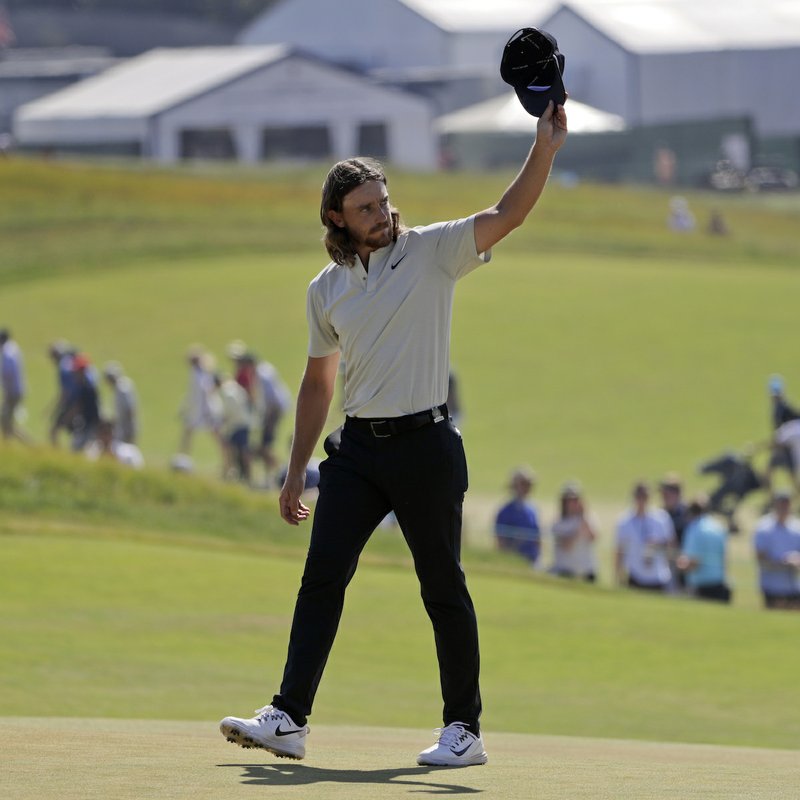 Tommy Fleetwood of England, waves to spectators after finishing the final round of the U.S. Open Golf Championship, Sunday, June 17, 2018, in Southampton, N.Y. (AP Photo/Frank Franklin II) 