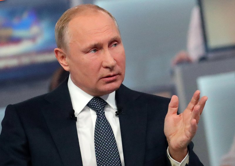 Associated Press file photo In this June 7, 2018, file photo, Russian President Vladimir Putin gestures while answering a question during his annual call-in show in Moscow, Russia. The Trump administration says it's "deeply concerned" by what it says is the growing number of political and religious prisoners in Russia. The State Department says there are more than 150 such prisoners. Spokeswoman Heather Nauert says the US wants Russia to release them immediately. The United States cites the case of four Ukrainians on a hunger strike, including filmmakers Oleg Sentsov.