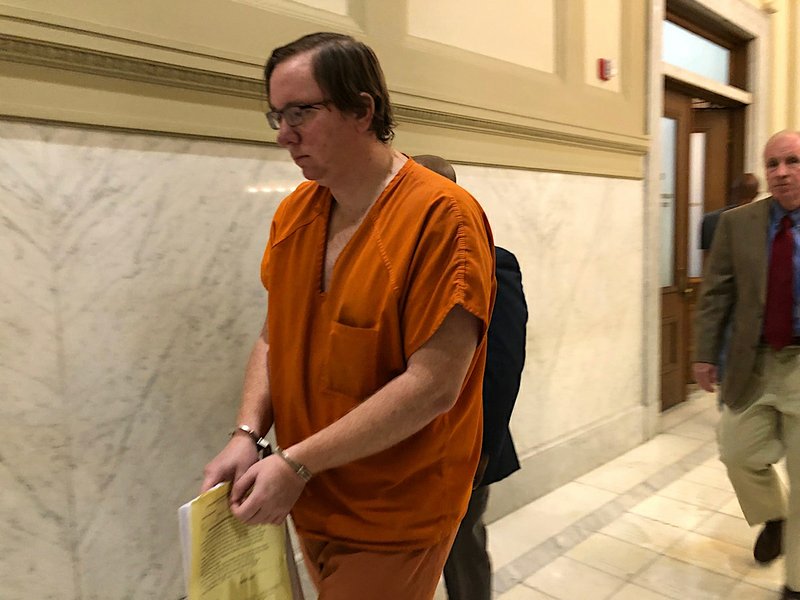 Doyle Ashcraft walks out of court Monday, June 18, 2018, in Little Rock after pleading not guilty by reason of mental defect in the killing of his wife, Marjorie. 