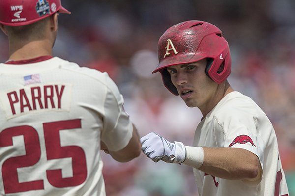 Carson Shaddy, Arkansas second baseman, hits a single in the 6th inning vs Texas Sunday, June 17, 2018, during game three of the NCAA Men's College World Series at TD Ameritrade Park in Omaha.