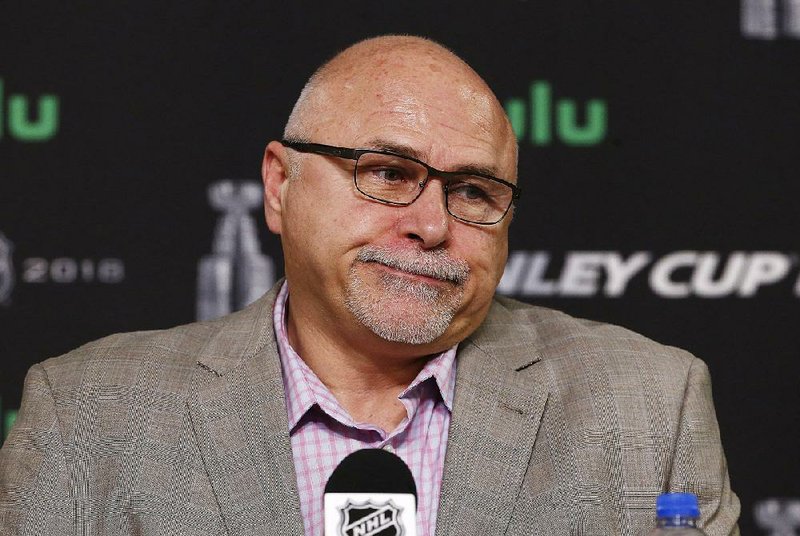 In this May 29, 2018, file photo, Washington Capitals head coach Barry Trotz pauses during a news conference after hockey practice in Las Vegas. Trotz has resigned as coach of the Washington Capitals after leading them to the Stanley Cup.  The team announced Trotz’s resignation Monday, June 18, 2018. 