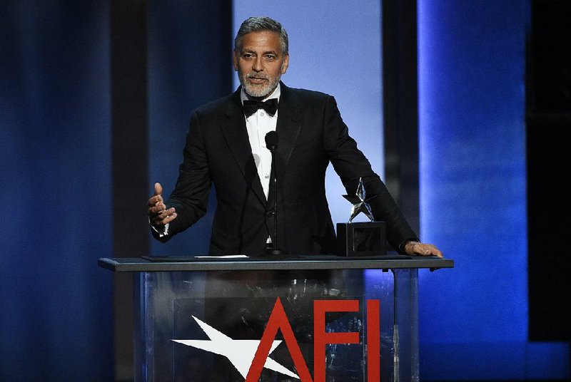 Actor/director George Clooney addresses the audience after accepting the 46th AFI Life Achievement Award during a gala ceremony at the Dolby Theatre, Thursday, June 7, 2018, in Los Angeles. 