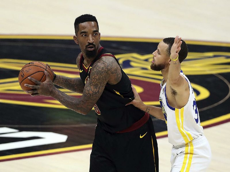Cleveland Cavaliers’ J.R. Smith (left) is shown in this file photo.