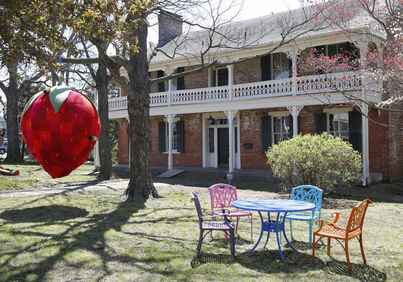 File photo/NWA Democrat-Gazette/DAVID GOTTSCHALK Walker-Stone House is in downtown Fayetteville. University of Arkansas School of Art students held a three-month residency at the 170-year-old house at 207 W. Center St.