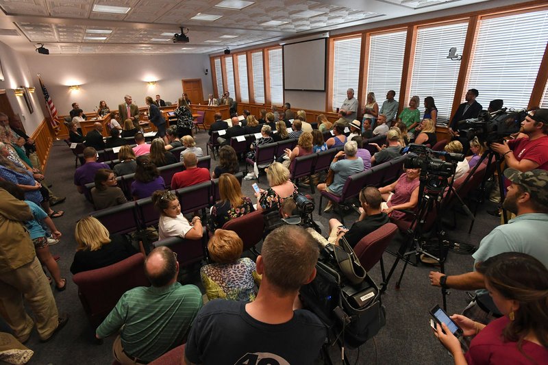 NWA Democrat-Gazette/J.T. WAMPLER A capacity crowd attends a Fayetteville School Board meeting to determine the fate of superintendent Matthew Wendt's employment at School District on Monday. The board voted to terminate Wendt's contract.