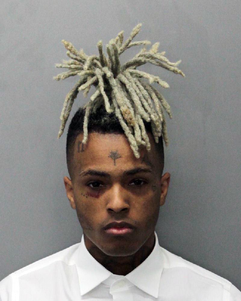 (Miami Dade Dept of Corrections via AP This 2017 arrest photo made available by the Miami Dade Dept. of Corrections shows Jahseh Onfroy, also known as the rapper XXXTentacion, under arrest. Onfroy was shot and killed, Monday, June 18, 2018, in Deerfield Beach, Fla.