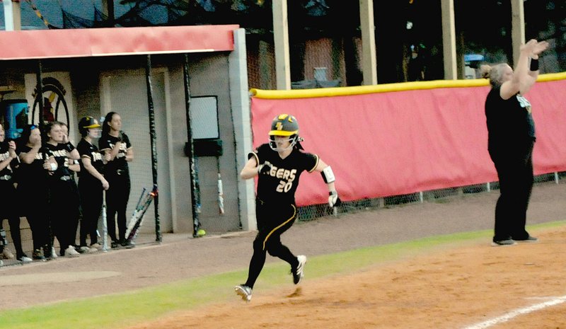 MARK HUMPHREY ENTERPRISE-LEADER Prairie Grove 2018 graduate Katharine McConnell, shown rounding third racing towards home to score a run against Conway during the Farmington Invitational softball tournament, was named All-Conference during her senior season. McConnell led the Lady Tigers with 34 hits in 64 at-bats for a .531 average and scored 21 runs with 17 RBIs, 10 doubles, 3 triples and 1 home run.