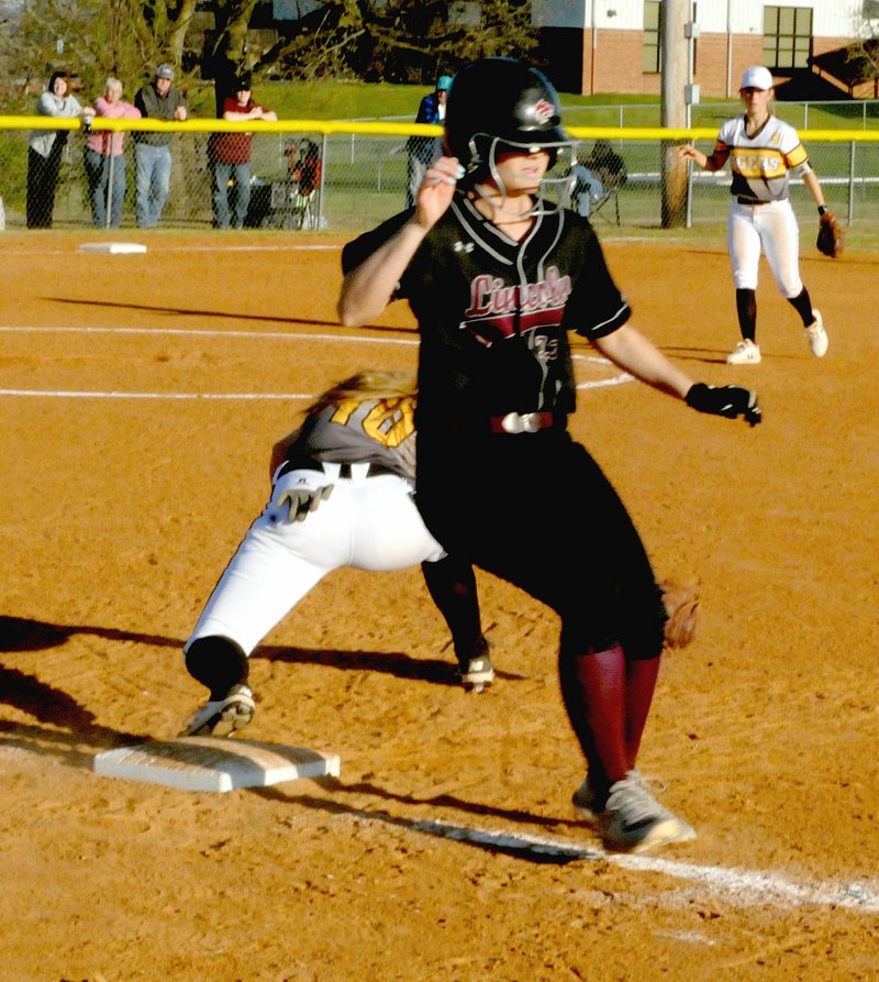 MARK HUMPHREY ENTERPRISE-LEADER Lincoln 2018 graduate, Hollie Webb, shown running to first base against Prairie Grove, has been selected as Female Athlete of the Year for school year 2017-2018 at Lincoln. As a senior Hollie Webb appeared in 25 games, batting .342 with 25 hits in 73 at-bats. She had 97 plate appearances at the top of the order, scoring 30 runs with 11 RBIs and 3 doubles. Hollie Webb took base 24 times on balls and reached on an error five times. Hollie Webb had 19 stolen bases to tie for the team lead with younger sister, Kinley Webb.