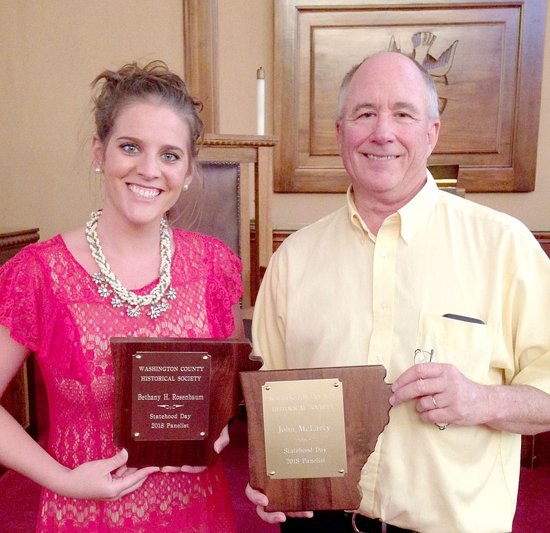 MAYLON RICE SPECIAL TO ENTERPRISE-LEADER Bethany Henry Rosenbaum and John McLarty show off their appreciation plaques following their presentation on historic trails of Arkansas and Washington County Arkansas at the Statehood Day ceremony, held June 10 at First Christian Church in Fayetteville. Arkansas' official statehood became law on June 15, 1836.