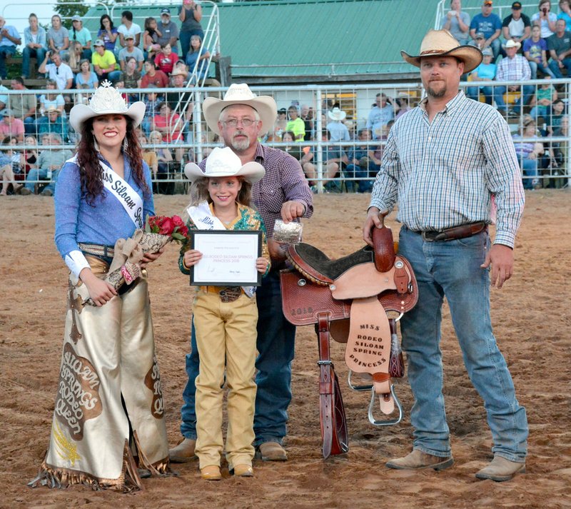 Janelle Jessen/Herald-Leader Brooklyn Teague, 10, of Siloam Springs, was crowned rodeo princess by 2017 Rodeo Queen Brittney Doshier on Saturday evening.