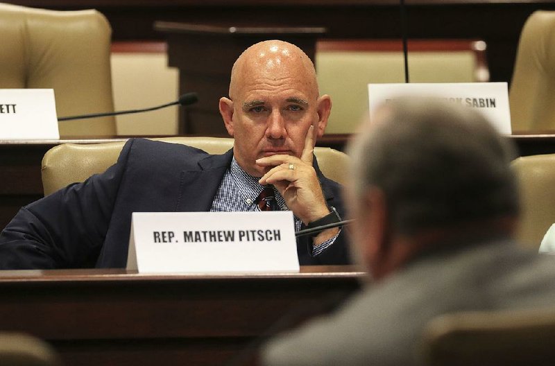 Rep. Mathew Pitsch, R-Fort Smith, listens Wednesday to testimony during a meeting of the Tax Reform and Relief Legislative Task Force. Pitsch won a runoff primary election Tuesday for Senate District 8 and will be in the Nov. 6 general election.  