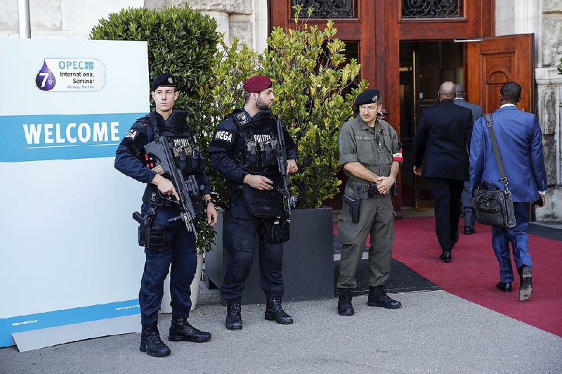 Police stand guard Wednesday in Vienna on opening day of the Organization of Petroleum Exporting Countries international seminar. 