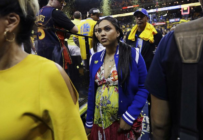 Ayesha Curry (center), wife of Golden State Warriors guard Stephen Curry, opened a barbecue restaurant in Houston — home of the Warriors’ bitter rival — to less than enthusiastic reviews from Rockets fans.  
