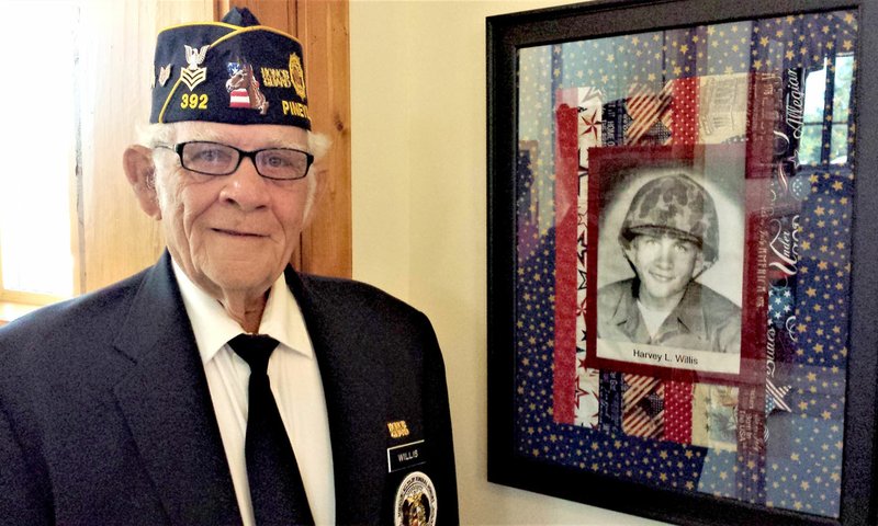 Courtesy photo Veteran Harvey Willis poses before his military photo, taken years ago during his time in the service.