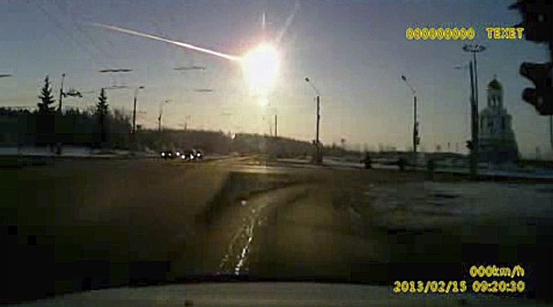 FILE - In this Feb. 15, 2013 image made from a dashboard camera video, a meteor streaks through the sky over Chelyabinsk, about 930 miles east of Moscow. On Wednesday, June 20, 2018, the U.S.'s National Science and Technology Council released a report calling for improved asteroid detection, tracking and deflection. NASA is taking part in the effort, along with federal emergency and White House officials. (AP Photo)