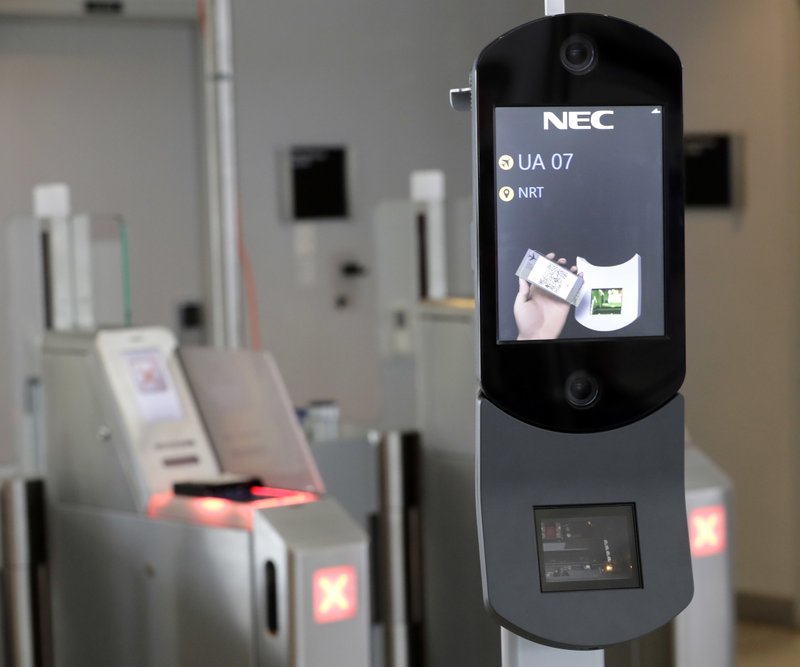 In this July 12, 2017 file photo, a U.S. Customs and Border Protection facial recognition device is ready to scan another passenger at a United Airlines gate at George Bush Intercontinental Airport, in Houston. Florida’s busiest airport is becoming the first in the nation to require a face scan of passengers on all arriving and departing international flights, including U.S. citizens, according to officials there. The expected announcement Thursday, June 21, 2018, at Orlando International Airport alarms some privacy advocates who say there are no formal rules in place for handling data gleaned from the scans, nor formal guidelines on what should happen if a passenger is wrongly prevented from boarding. (AP Photo/David J. Phillip, File)