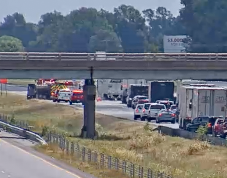 This screenshot from an Arkansas Department of Transportation live traffic camera shows an overturned truck that was blocking part of I-40 on Thursday.