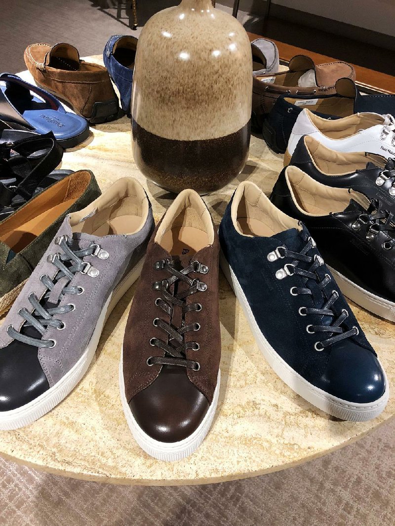 Dress sneakers, like these by Paul Stuart, present a polished casual daywear look.  