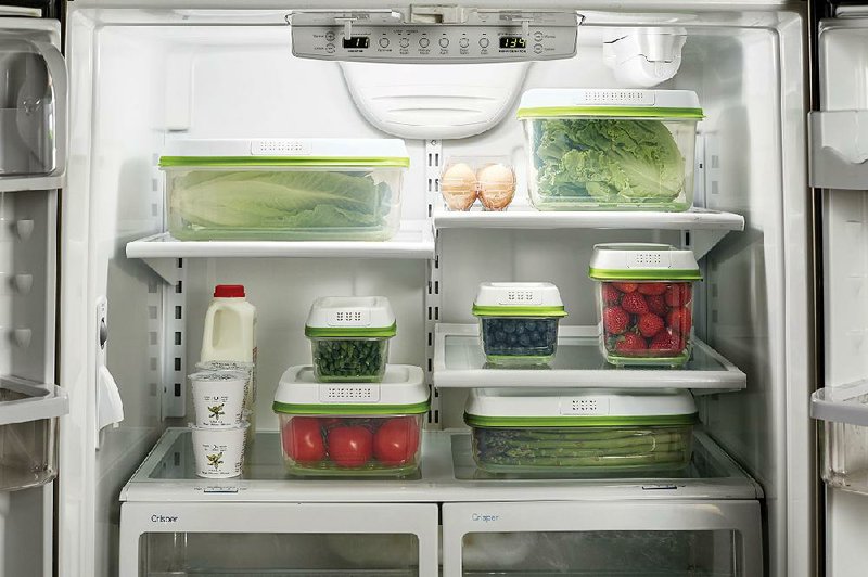 This undated photo provided by Rubbermaid shows Rubbermaid's FreshWorks food storage system, which have vented lids and crisper trays that keep foods like fruits and vegetables fresher longer. Storing perishables in the fridge and off counters is a key way to keep pests at bay in the urban kitchen and systems like these are convenient to store in limited cupboard space. (Rubbermaid via AP)