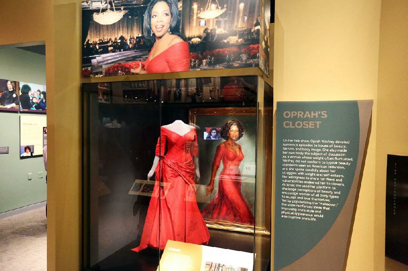 Clothing and personal belongings are among the items on display in “Watching Oprah: The Oprah Winfrey Show and American Culture,” a new temporary exhibit at the National Museum of African American History and Culture. AP/TRAMON LUCAS 
