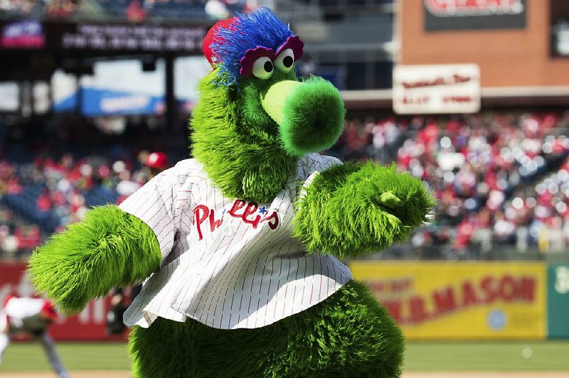 The Phillie Phanatic, the mascot of the Philadelphia Phillies baseball team, struck a fan in the face when using a hot dog launcher Monday. 
