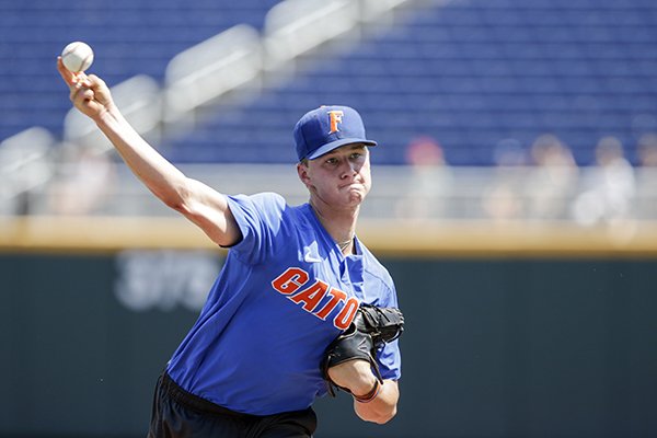 Florida pitcher Brady Singer throws during practice at TD Ameritrade Park in Omaha, Neb., Friday, June 15, 2018 (AP Photo/Nati Harnik)

