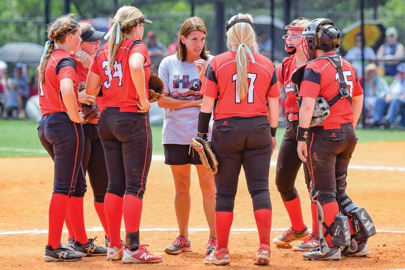 Haskell Harmony Grove softball coach Sammi Massey, center, talks to her team during the Class 3A state-championship game last month. Massey, who is leaving coaching, is the 2018 Tri-Lakes Edition Coach of the Year.
