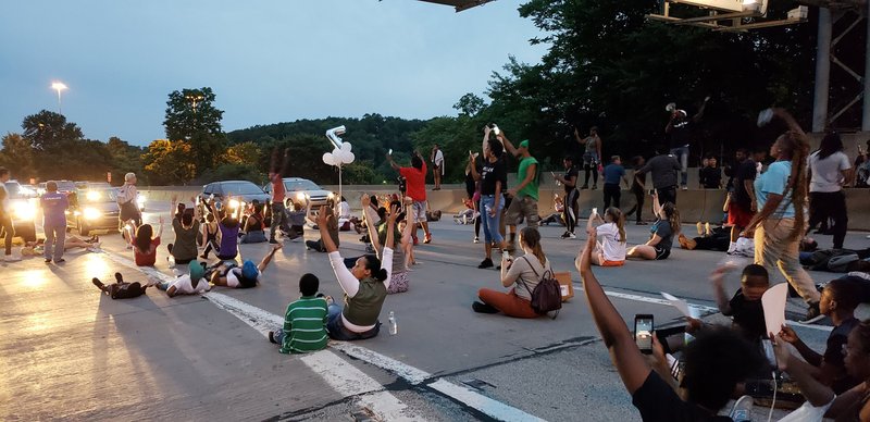 People protesting the East Pittsburgh police after the June 19 shooting death of Antwon Rose shut down Interstate 376 in Pittsburgh on Thursday, June 21, 2018. Rose, a 17-year-old boy fatally shot by a police officer in Pennsylvania seconds after he fled a traffic stop, did not pose a threat to anyone, a lawyer for the family of the teen said. (Andrew Goldstein/Pittsburgh Post-Gazette via AP)