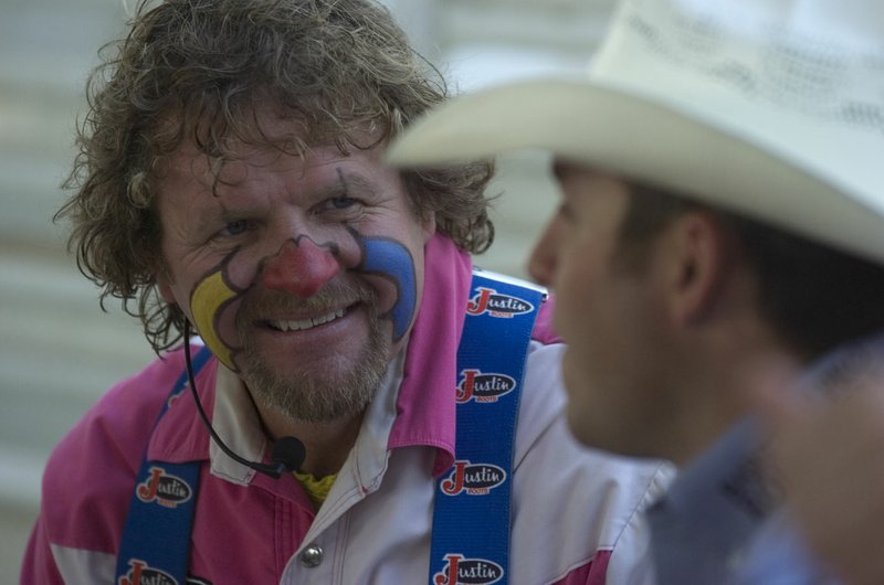 File Photo Rodeo clown Troy Lerwill visits with cowboy Jessy Davis at a previous Rodeo of the Ozarks. Lerwill will bring his comedy and his motorcycle skills to town for the 74th edition of the event.