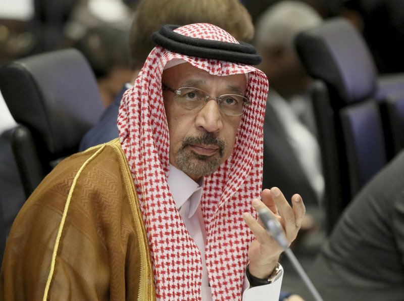 Khalid Al-Falih Minister of Energy, Industry and Mineral Resources of Saudi Arabia speaks prior to the start of a meeting of the Organization of the Petroleum Exporting Countries, OPEC, and non OPEC members at their headquarters in Vienna, Austria, Saturday, June 23, 2018. (AP Photo/Ronald Zak)