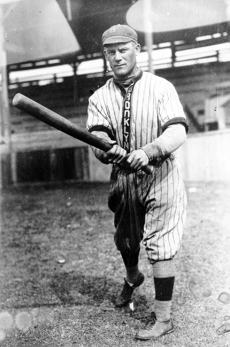 Norman “Kid” Elberfeld is shown in action with the Brooklyn Dodgers in 1914. The Tabasco Kid wore a whalebone patch on his right shin because he was frequently spiked while turning the double play.
