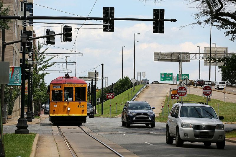 FILE - The River Rail Trolley cruises down East Second Street in Little Rock on June 22, 2018. 