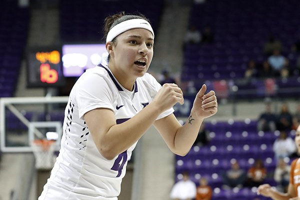 TCU guard Amber Ramirez (4) celebrates a basket against Texas in the first half of an NCAA college basketball game, Wednesday, Jan. 10, 2018, in Fort Worth, Texas. (AP Photo/Tony Gutierrez)

