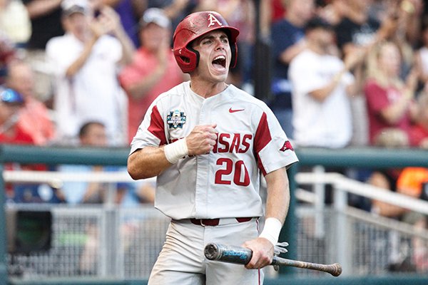 Arkansas second baseman Carson Shaddy reacts after scoring a run during the fifth inning of a College World Series championship game against Oregon State on Tuesday, June 26, 2018, in Omaha, Neb.