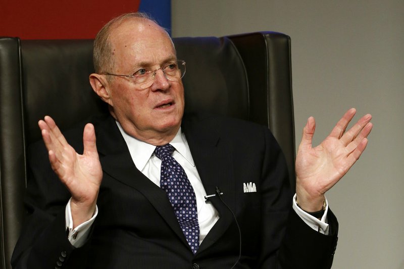 In this Oct. 3, 2013, file photo, Supreme Court Justice Anthony Kennedy speaks to faculty members at the University of Pennsylvania law school in Philadelphia. The 81-year-old Kennedy said Tuesday, June 27, 2018, that he is retiring after more than 30 years on the court.(AP Photo/Matt Slocum, File)