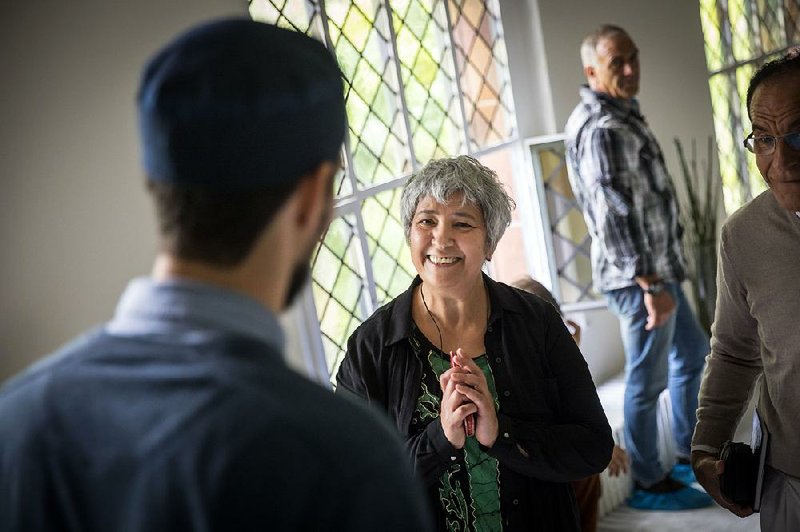 Seyran Ates (center) in the prayer room at the Ibn Rushd-Goethe Mosque in Berlin. Ates, a Turkish-born German lawyer and women’s rights activist, created Germany’s first liberal Muslim house of worship.  (Gordon Welters/The New York Times)