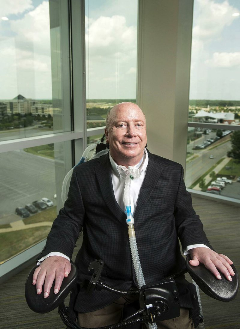 Tommy Van Zandt poses for a photo Wednesday, June 13, 2018, at the Sage Partners office in Rogers.  