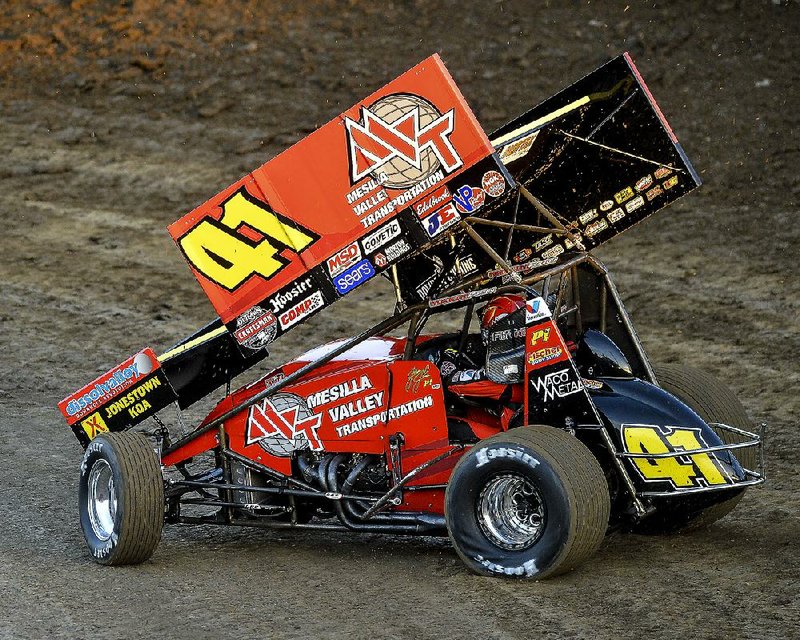 Jason Johnson of Eunice, La., races at Riverside International Speedway in West Memphis earlier this season. Johnson died after a crash Saturday night during a World of Outlaws event in Wisconsin.

Special to the Democrat-Gazette/JIMMY JONES