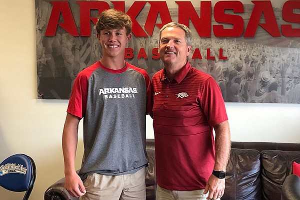 Benton pitcher Peyton Pallette poses for a picture with Arkansas coach Dave Van Horn. 