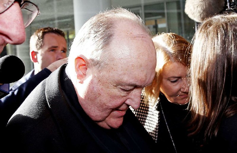 Australian Archbishop Philip Wilson arrives for sentencing Tuesday at a courthouse in Newcastle, Australia.  