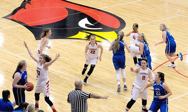 MARK HUMPHREY ENTERPRISE-LEADER Farmington's starting line-up: Joelle Tidwell (defending in-bounder), Alexis Roach, Makenna Vanzant, Madsyn Pense and Camryn Journagan endeavor to wreak havoc with sticky man-to-man defense against Greenbrier on an in-bounds play. The Lady Cardinals qualified for state with a resounding 76-42 first-round victory over Greenbrier Monday, Feb. 19, 2018, during the 5A West Conference tournament. The Farmington girls won the tournament and advanced to the State 5A quarterfinals. Six Lady Cardinals were recognized with postseason awards.