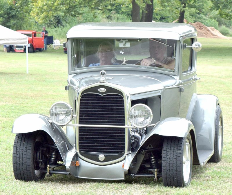 Westside Eagle Observer/MIKE ECKELS A vintage Ford Model A rolls into Veterans Park to be displayed during the Decatur Barbecue Car Show Aug. 5, 2017, in Decatur. The car show returns to Veterans Park for the 65th Annual Decatur Barbecue Aug. 4 from 10 a.m. to 3 p.m.