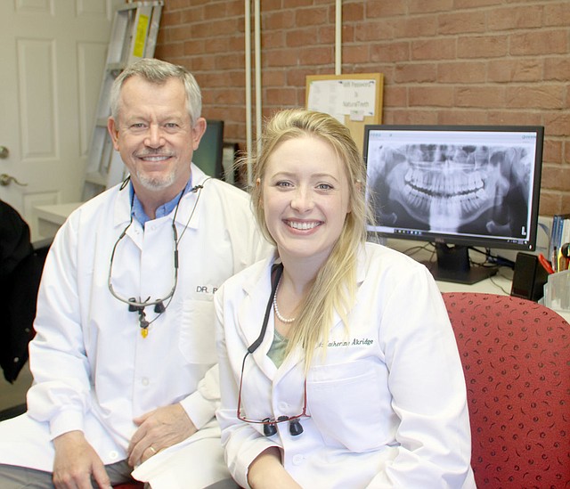 LYNN KUTTER ENTERPRISE-LEADER Dr. Catherine Akridge is a new dentist with Dr. John Bain in Farmington. She is a graduate of the University of Arkansas and a recent graduate of the School of Dentistry at Louisiana State University.