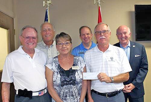Photo submitted Local charities receiving grants from the Bella Vista Foundation from net proceeds of the recent 2018 Cooper Communities NWA Charity Classic professional golf tournament were: Curt Stoops (back, left), BV Animal Shelter; Tom Judson, COO Bella Vista POA; Peter Christie, mayor; Tom Pyatt (front, left), vice-president Bella Vista Foundation; Diedre Knight, BV Animal Shelter; and Charlie Teal, president, Bella Vista Foundation.