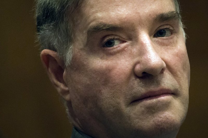  In this Nov. 18, 2014, file photo, former billionaire Eike Batista, a Brazilian tycoon once named No. 7 on Forbes' list of the world's richest people, attends his hearing at a federal criminal court in Rio de Janeiro, Brazil.  