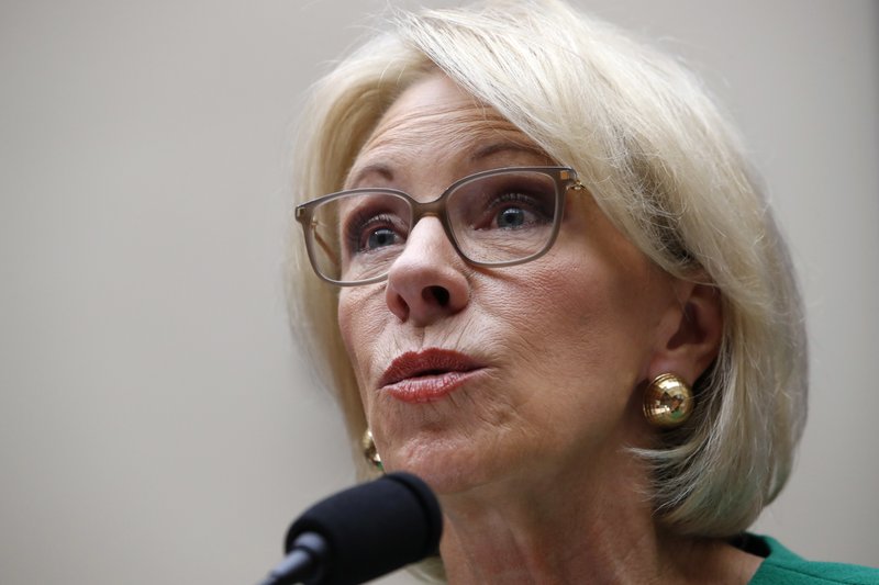 In this May 22, 2018 file photo, Education Secretary Betsy DeVos testifies at a House Committee on Education and the Workforce, n Capitol Hill in Washington. (AP Photo/Jacquelyn Martin)